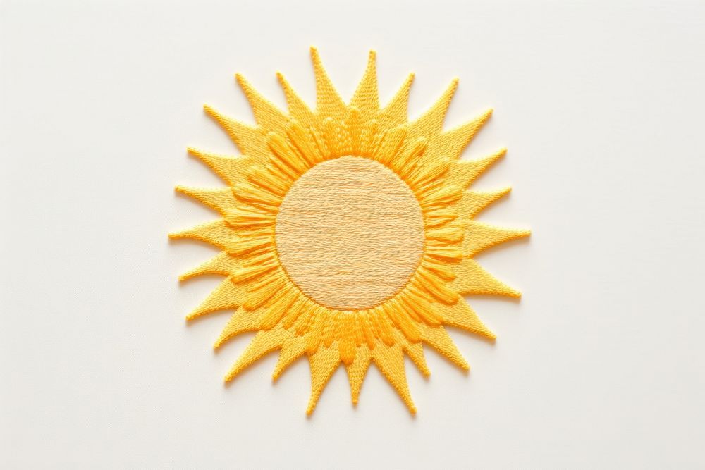 Sun in embroidery style sunflower textile pattern.