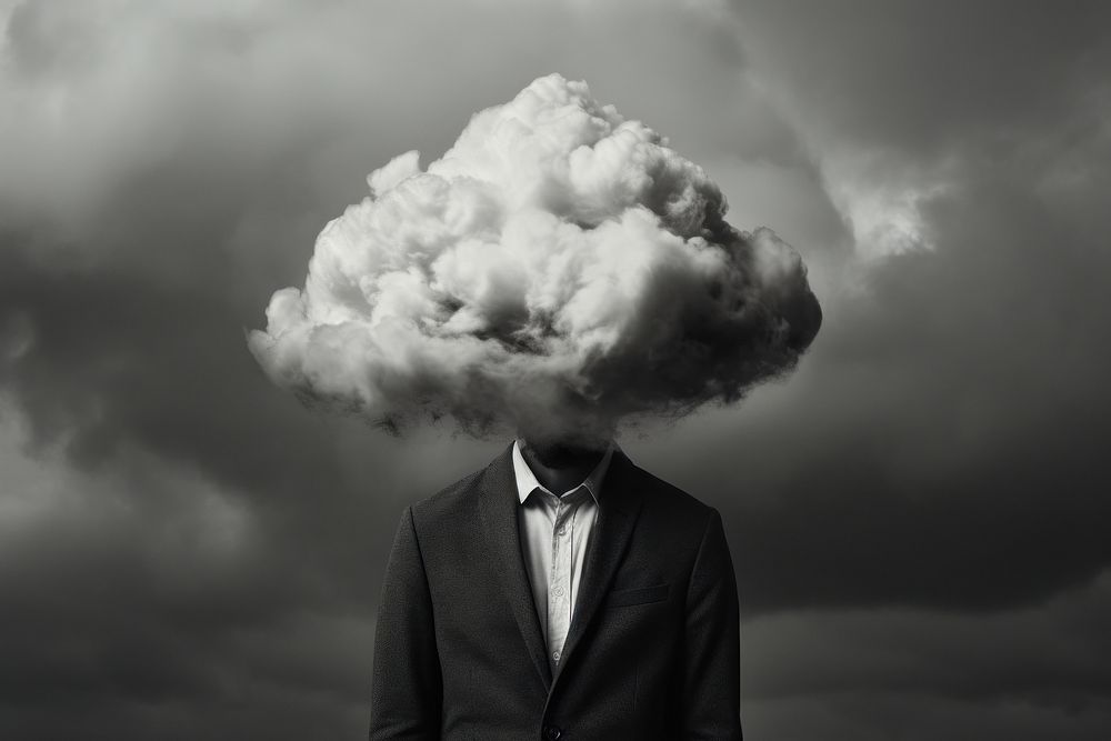 Man with a dark cloud over his head portrait outdoors nature.