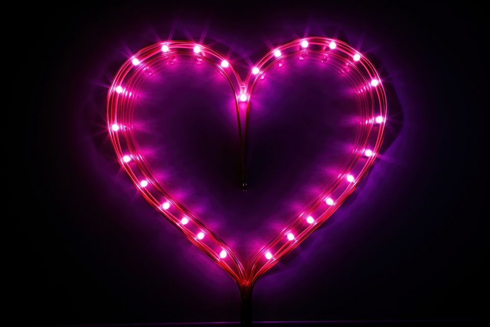 Photography of heart radiant silhouette light neon illuminated.