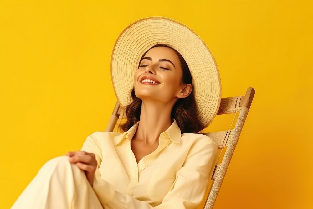 Young calm woman chair laughing yellow.