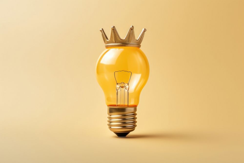 Light bulb with gold crown lightbulb innovation yellow.