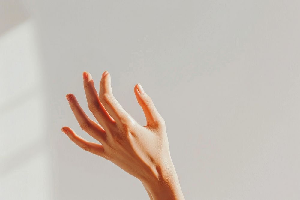 Hand holding finger skin gesturing.