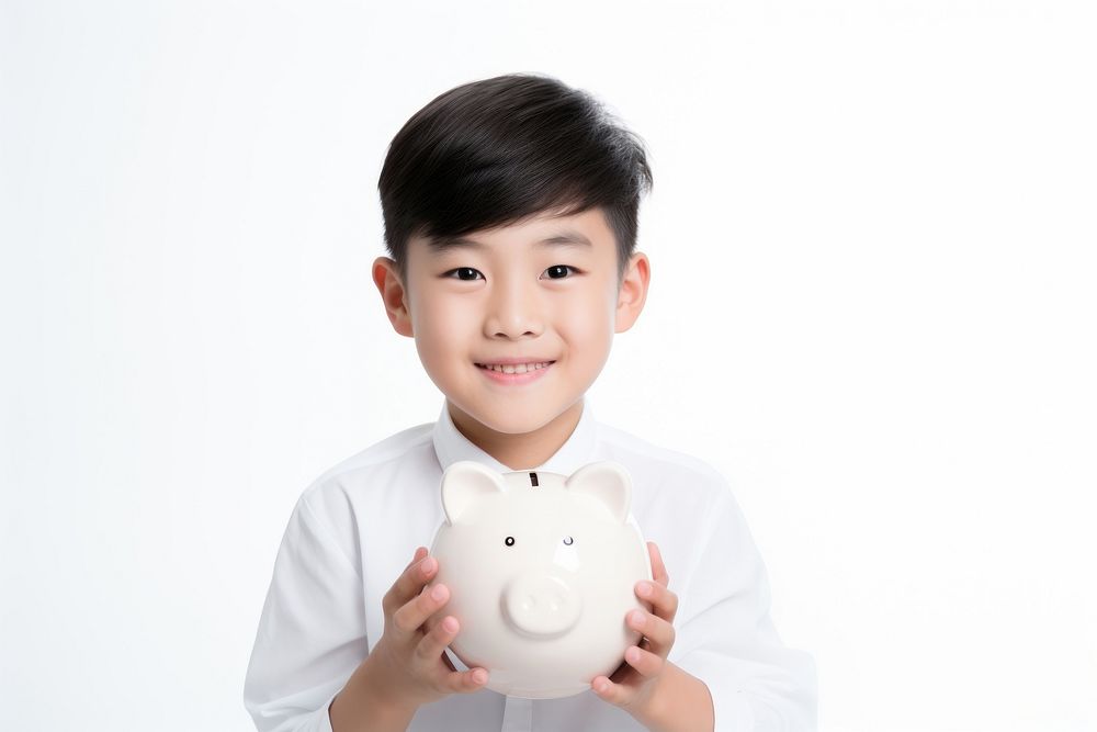 Kid holding piggy bank child investment happiness.