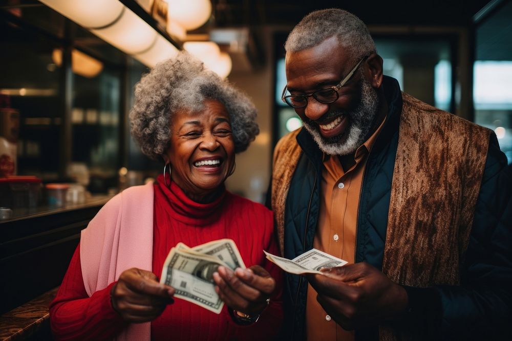Black old happy couple saving money savings adult togetherness.