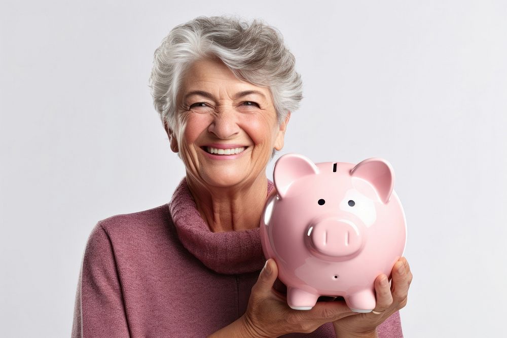 Girl holding his piggy bank adult happy retirement.