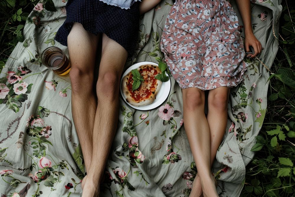 Teenager picnic adult food togetherness.