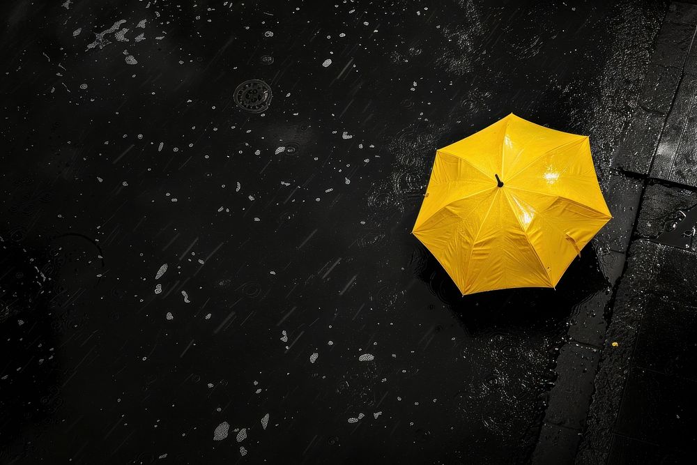 Yellow umbrella rain protection monochrome.