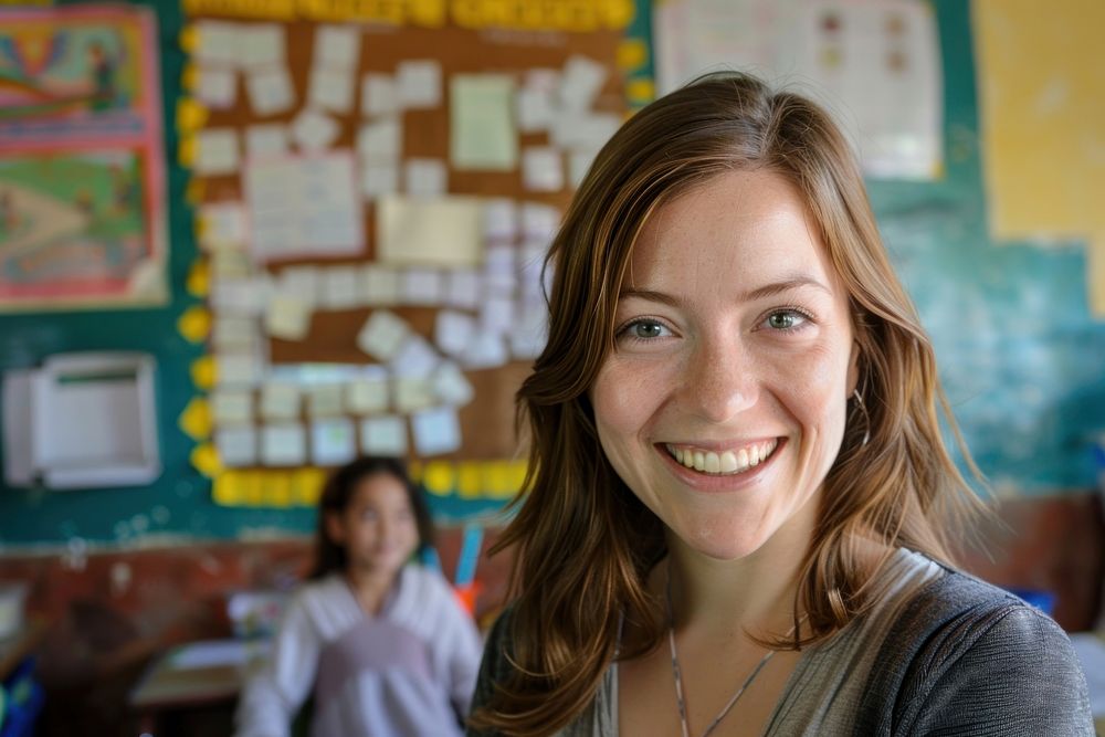Teacher portrait smiling school.
