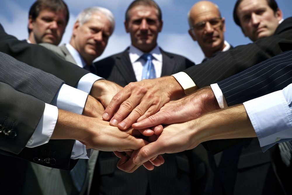 Business consultant joining hands adult togetherness cooperation.