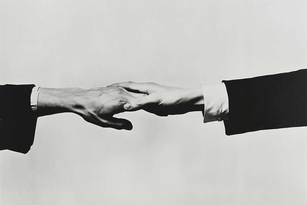 Man joining hands handshake adult monochrome.