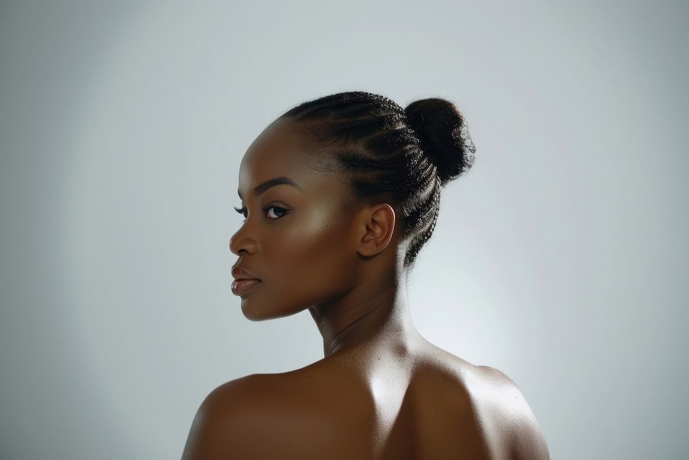 An African-American woman adult skin contemplation.
