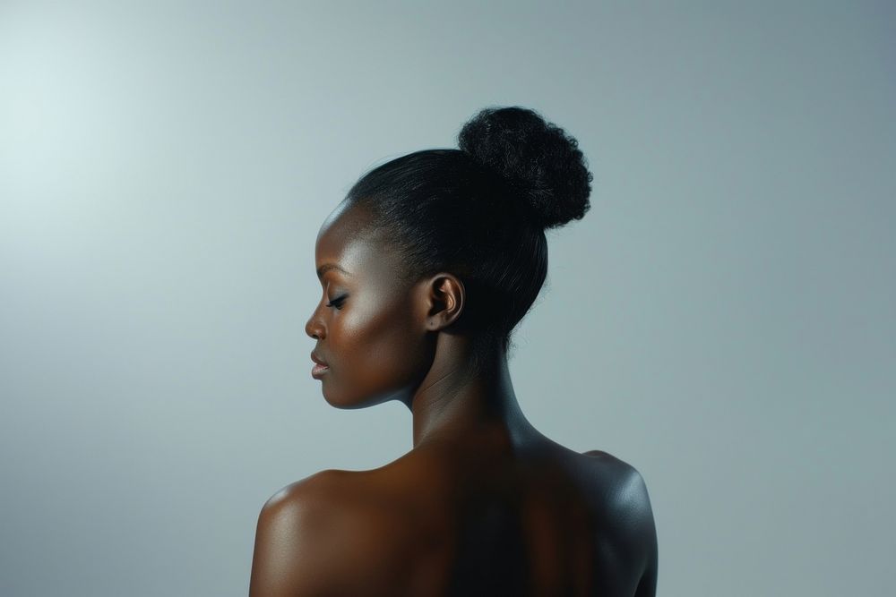 An African-American woman portrait adult back.