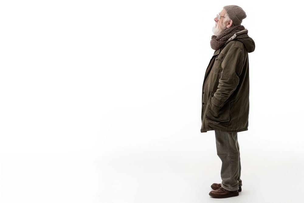 Elderly person overcoat footwear standing.