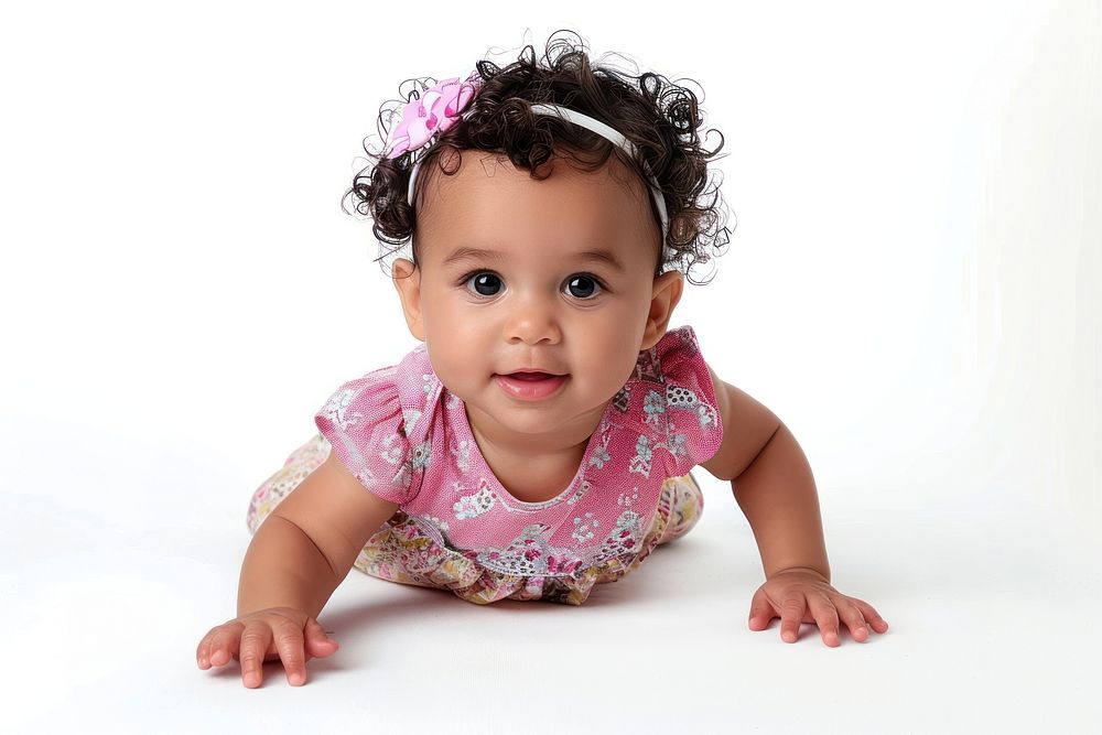 Baby girl crawling white background innocence.