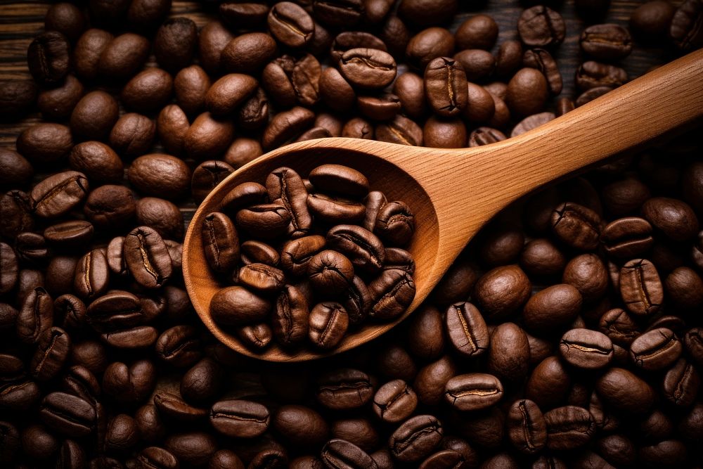 Coffee bean on roasted coffee beans refreshment backgrounds.
