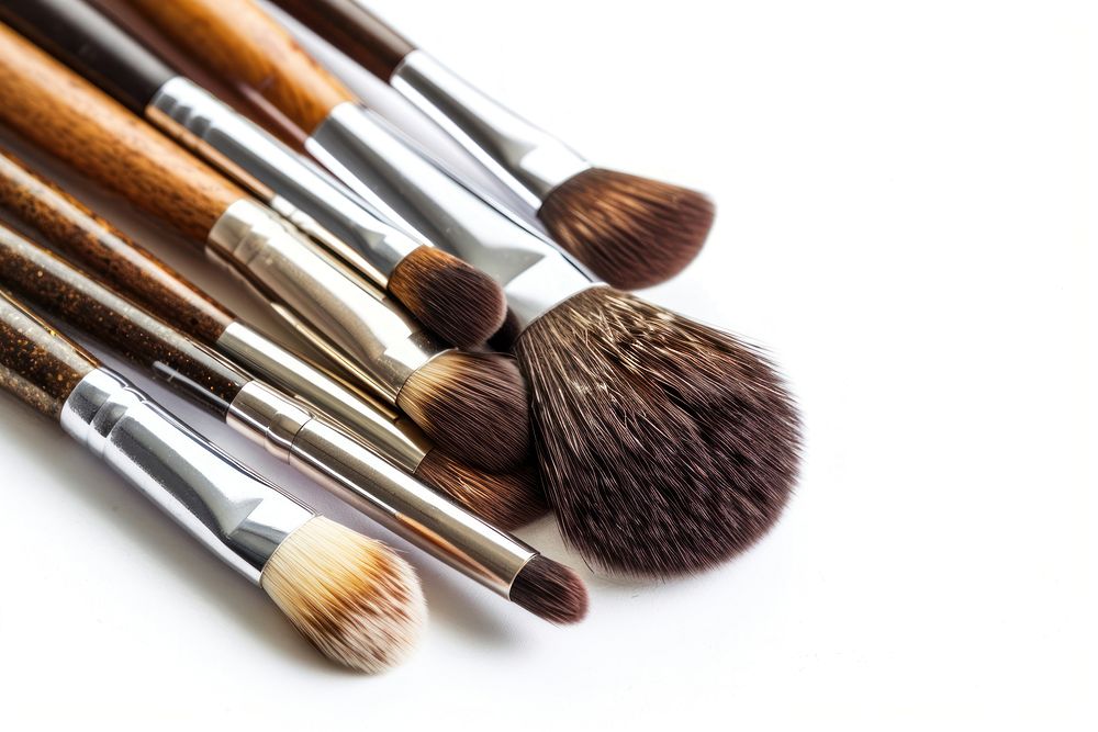 Makeup brushes cosmetics white background variation.