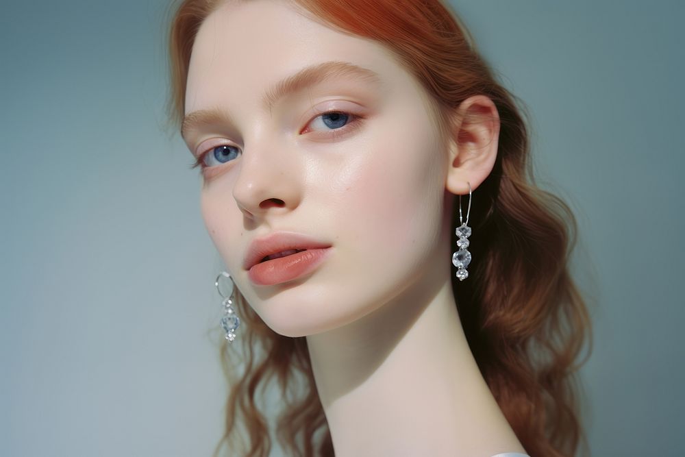 Woman wear daimonds earrings photography portrait jewelry.