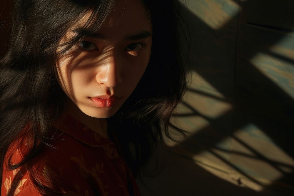 Asian woman portrait shadow red.