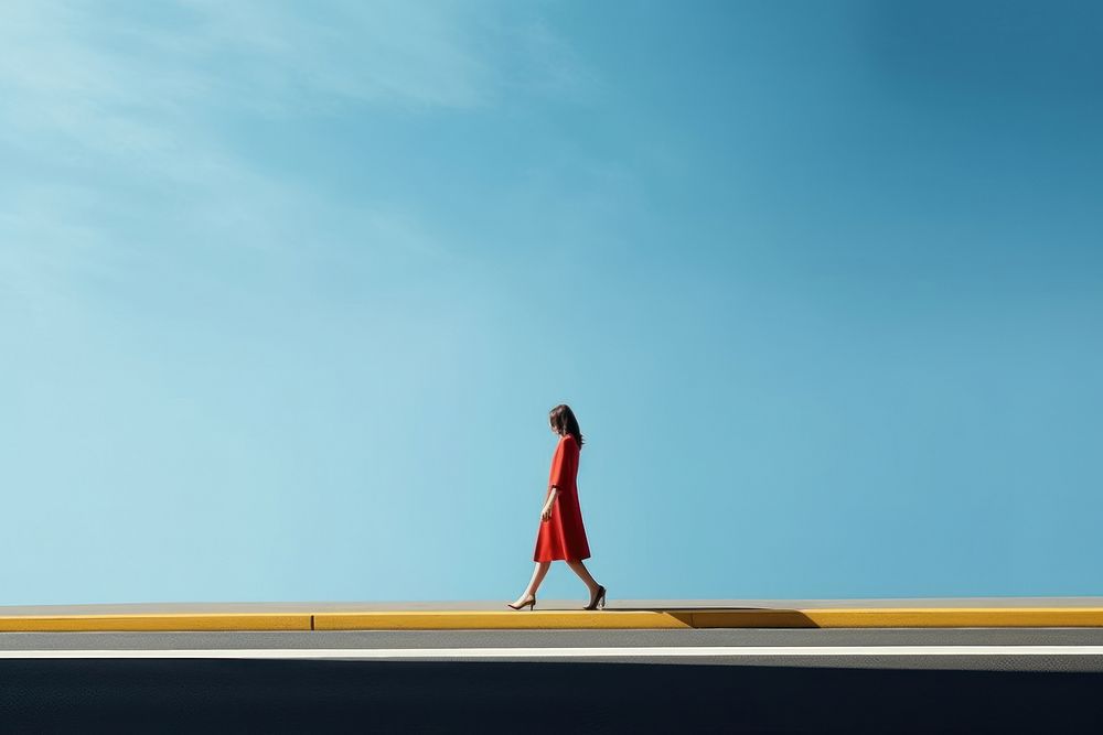 A minimalistic photography of a lady crossing the road advertisment style outdoors standing horizon.
