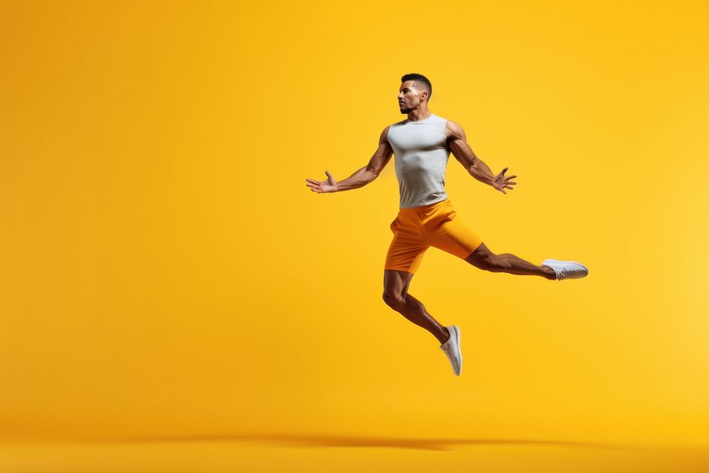 A minimalistic photography of a man exercising advertisment style jumping adult exhilaration.
