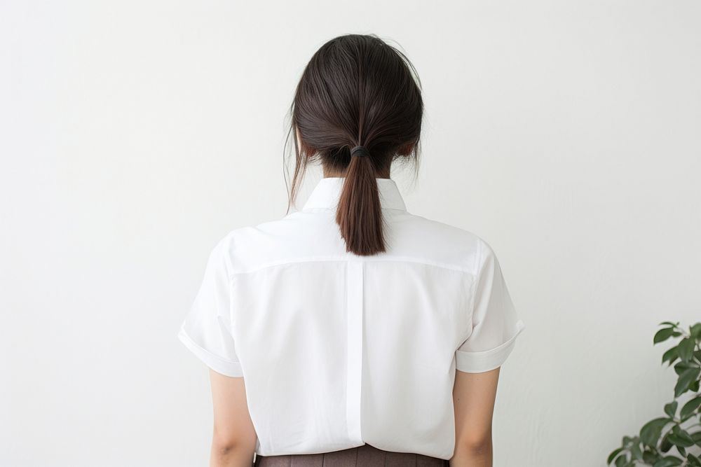 Woman showing her back ponytail blouse adult.