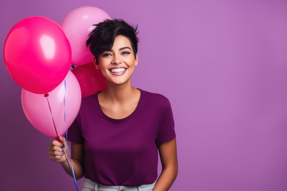 Very happy young woman balloon holding purple.