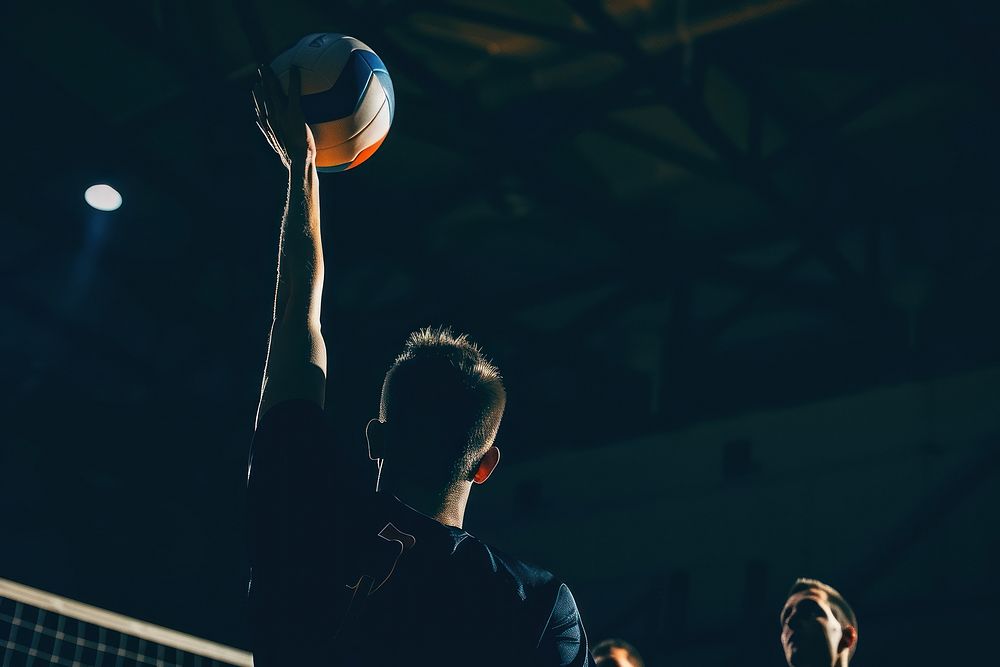 Man serving a volleyball adult basketball sports.