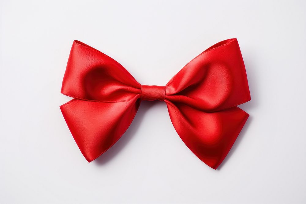 Red ribbon white background celebration accessories.