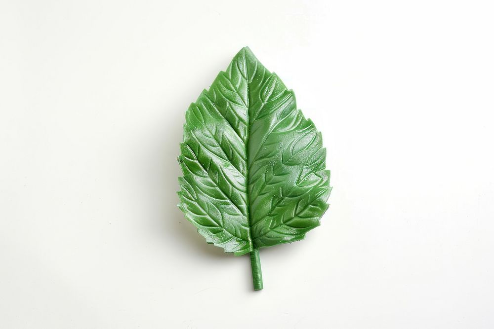 A mint leaf plasticine Childish style vegetable plant food.