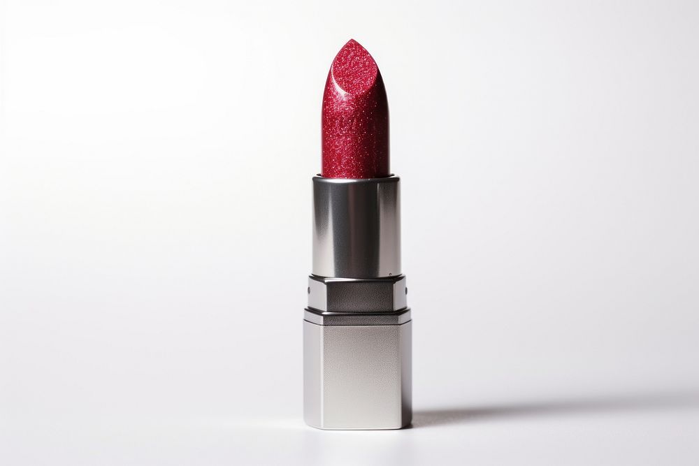 Red glitter polish lipstick cosmetics white background glamour.