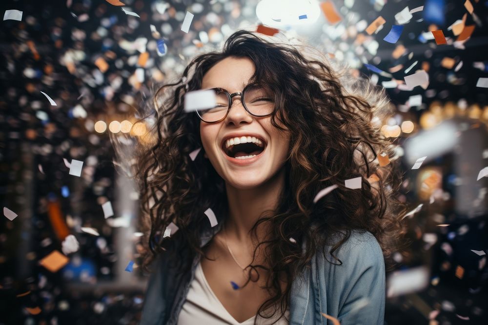 Woman enjoying cheerful laughing confetti.
