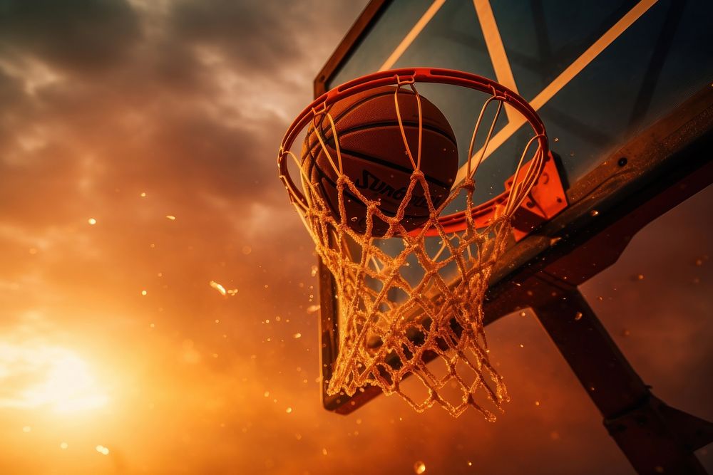 Basketball through basketball hoop sports outdoors scoring.
