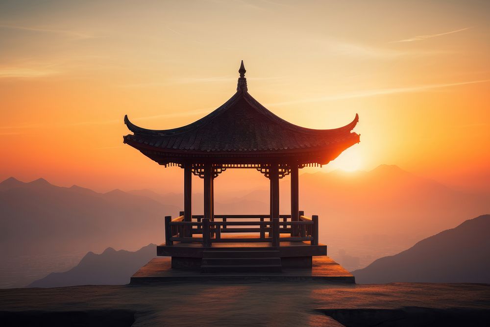 Temple at mountain border architecture outdoors sunset.