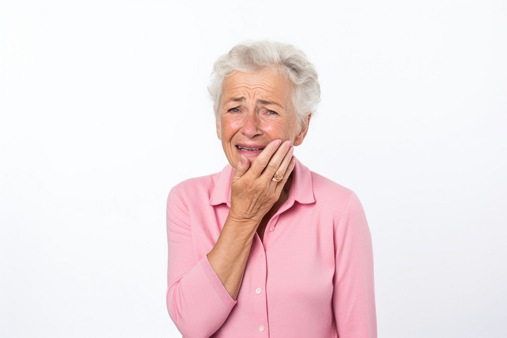 Senior women touching cheek with hand portrait adult photo.