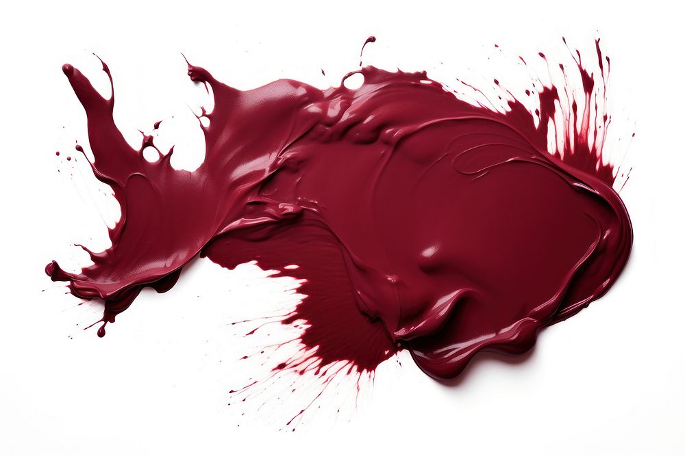 Solid maroon paint white background splattered abstract.