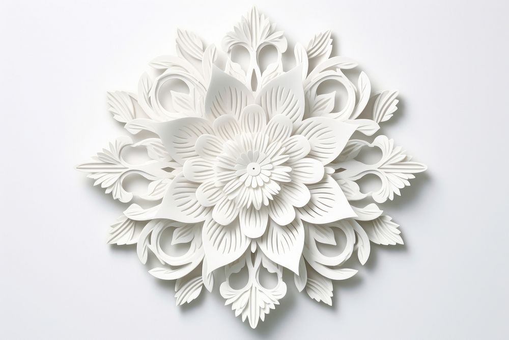 Paper cutout flower pattern white craft art.