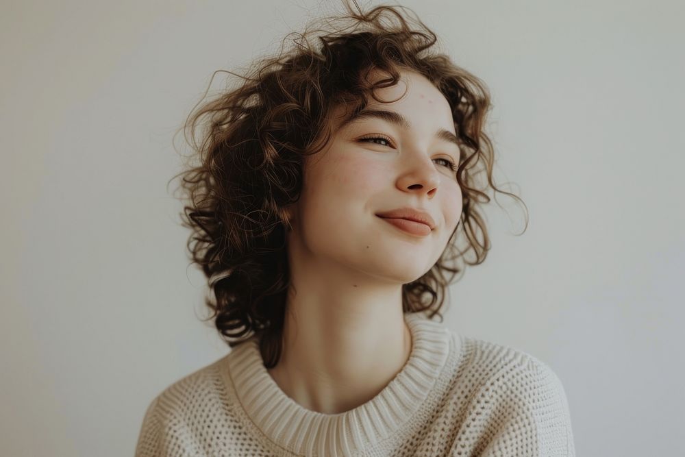 Woman with curly hair smiling adult white contemplation.