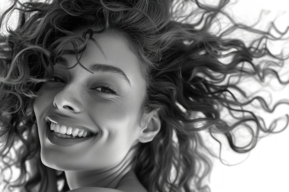 Woman with curly hair smiling portrait adult teeth.