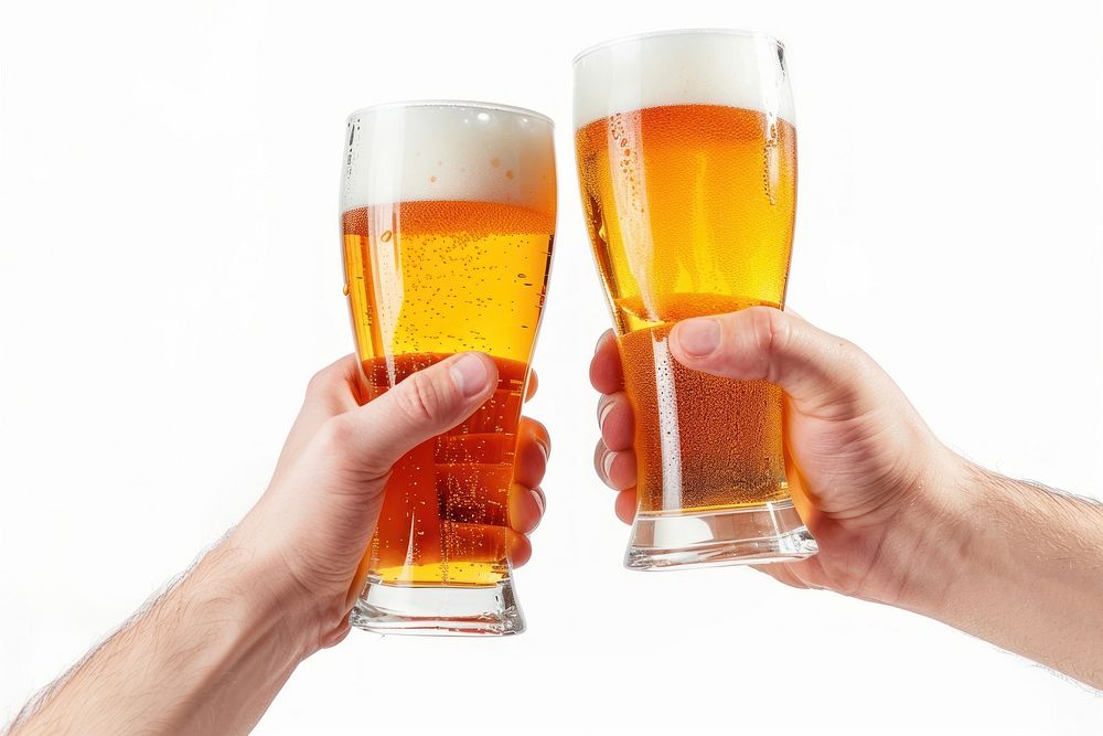 Hand holding beers lager drink glass.