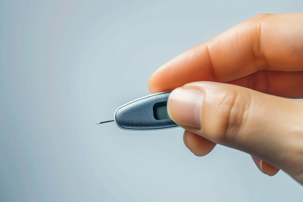 Finger using Glucose Meter thermometer technology syringe.