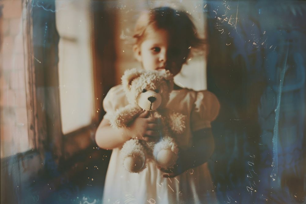 Baby girl holding teddy bear photography portrait child.