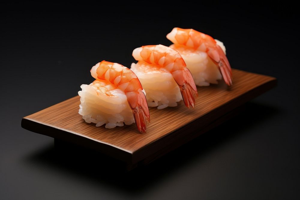Shrimp sushi wooden dish seafood rice meal.