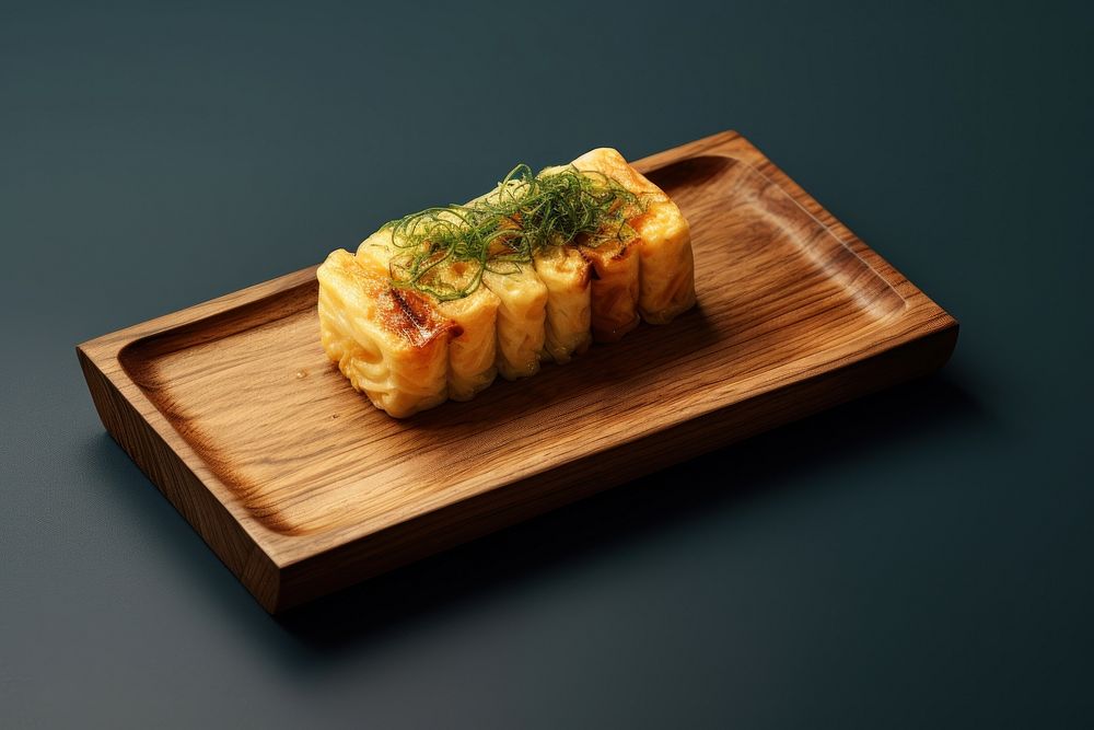 Tamagoyaki sushi wooden dish food meal vegetable.