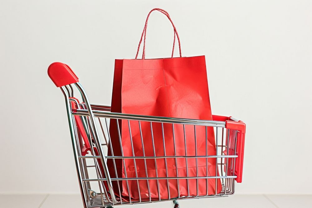 Shopping bag in shopping cart handbag consumerism accessories.
