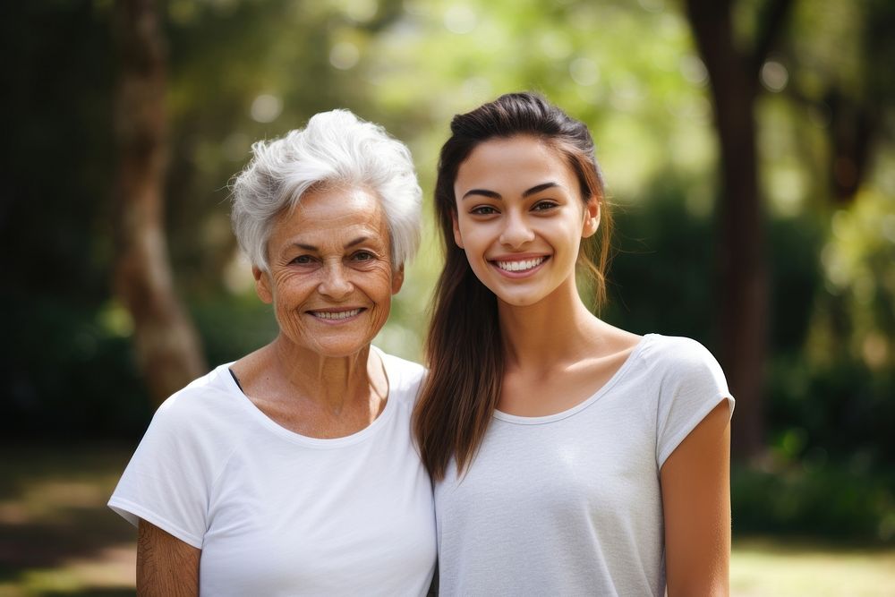 Old woman and young woman smiling adult smile.