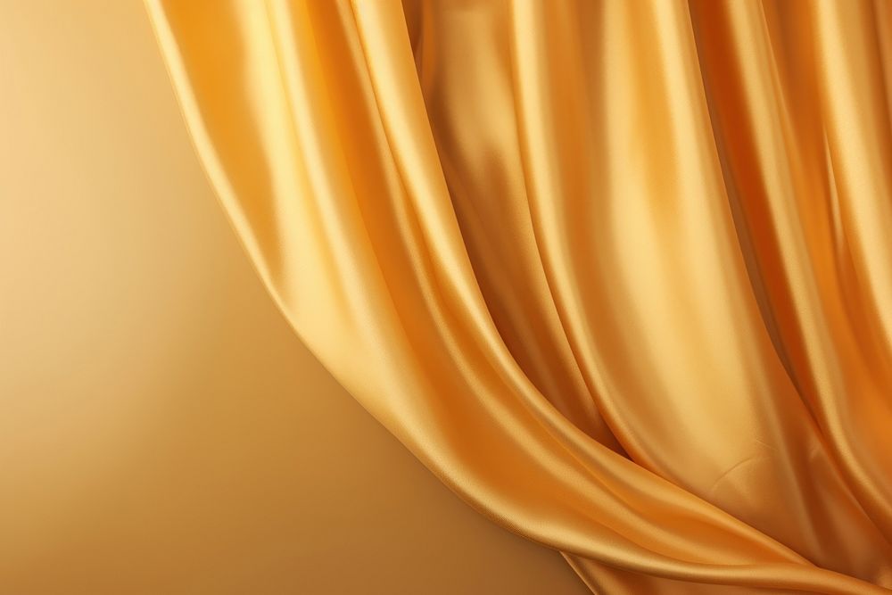 Gold silk fabric curtain backgrounds copy space elegance.