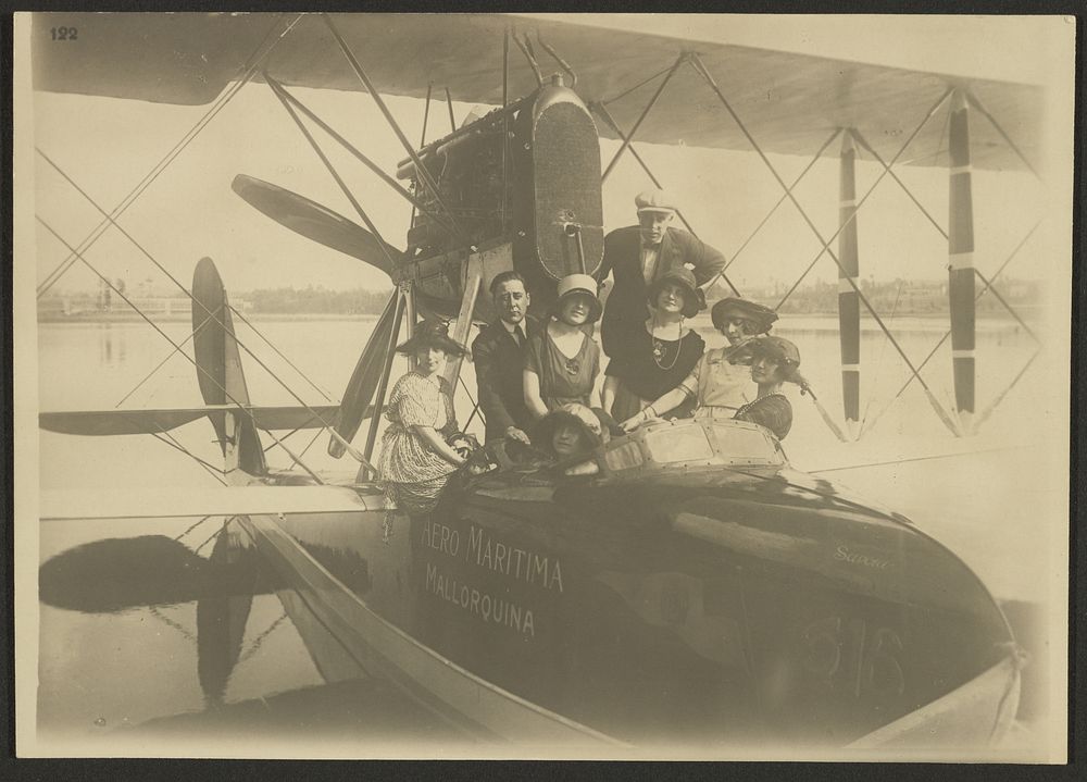 Group portrait in airplane by Fédèle Azari