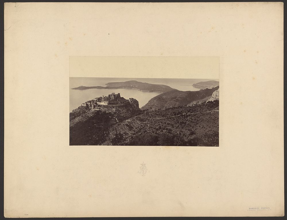 Landscape of hills and town overlooking coast