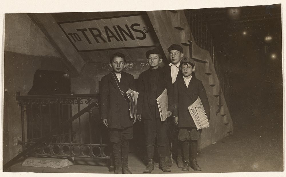 Four Newsies at an Entrance to the Subway, New York City by Lewis W Hine