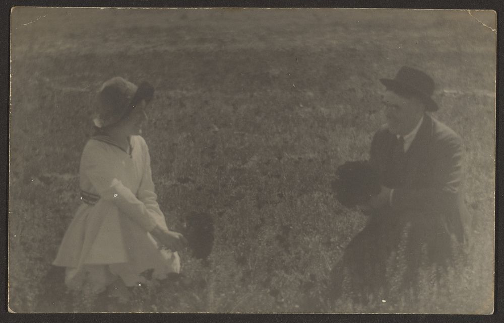 Fleckenstein and Daughter Sitting in Field with Flowers by Louis Fleckenstein